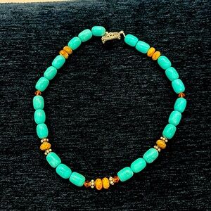 Turquoise necklace with silver and other beads